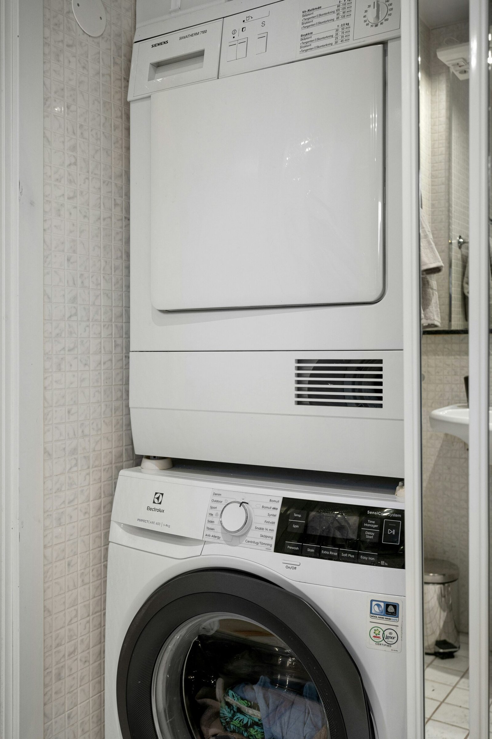 A washer and dryer stacked on top of each other