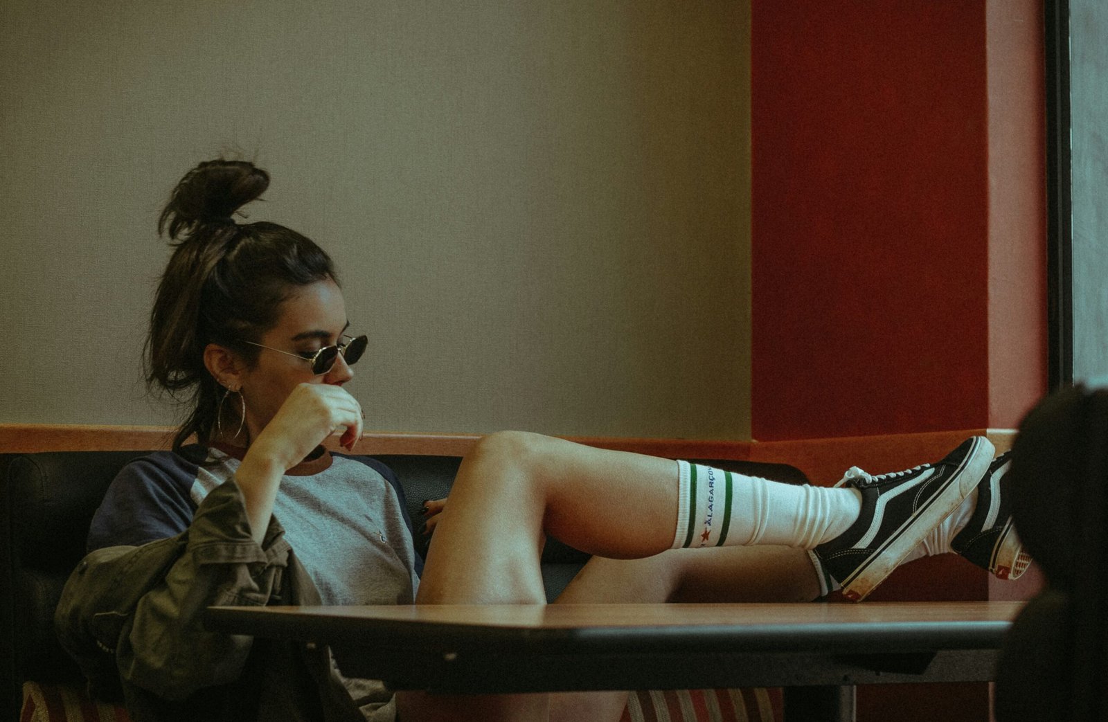 woman sitting on couch
